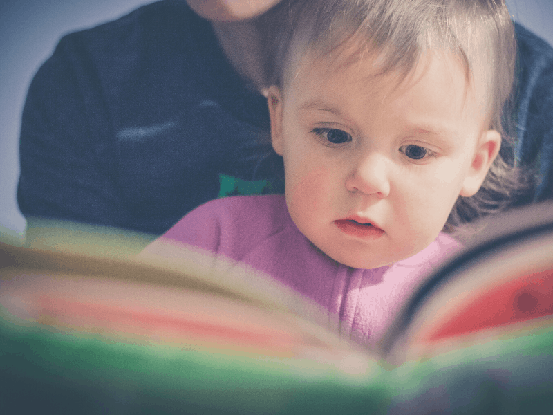 father reading to his child